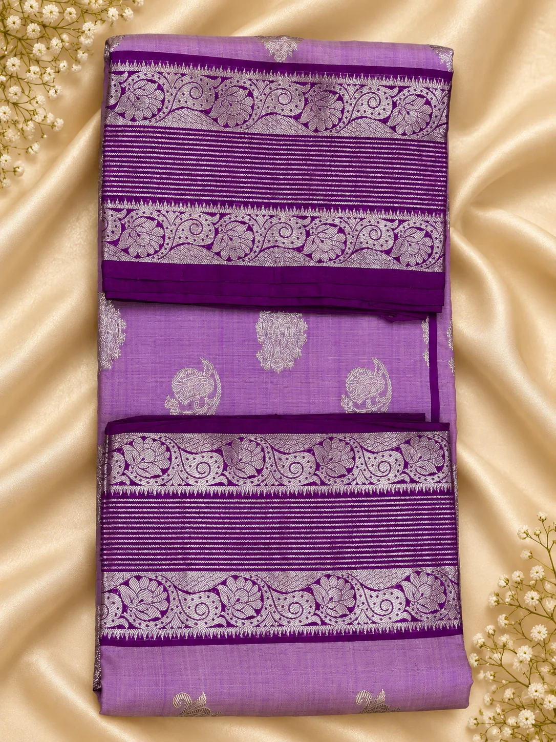 Venkatagiri Pattu Light – Purple & Lilac — lilac saree with purple and silver border, folded